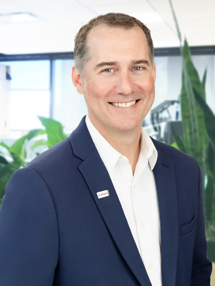 Professional headshot of Drew Beck