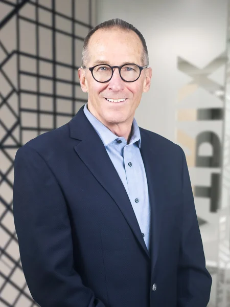 Professional headshot of Tom Berger