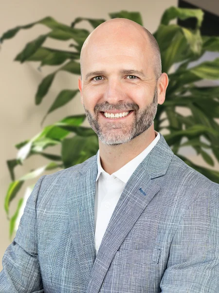Professional headshot of Joshua Eldridge