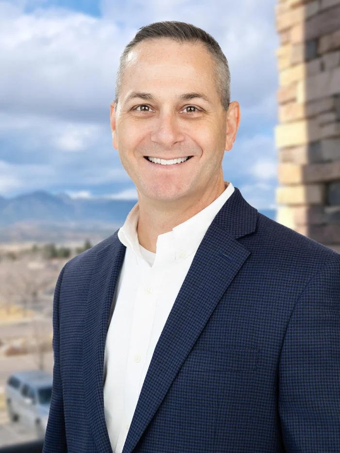 Professional headshot of Charlie Kuhl