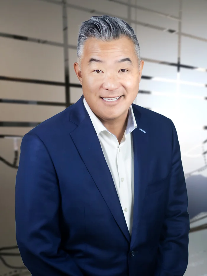 Professional headshot of Eric Hiraga